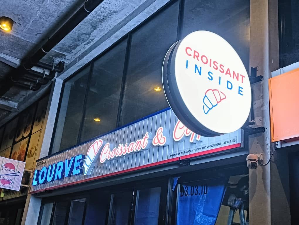 Croissant Inside illuminated projecting sign