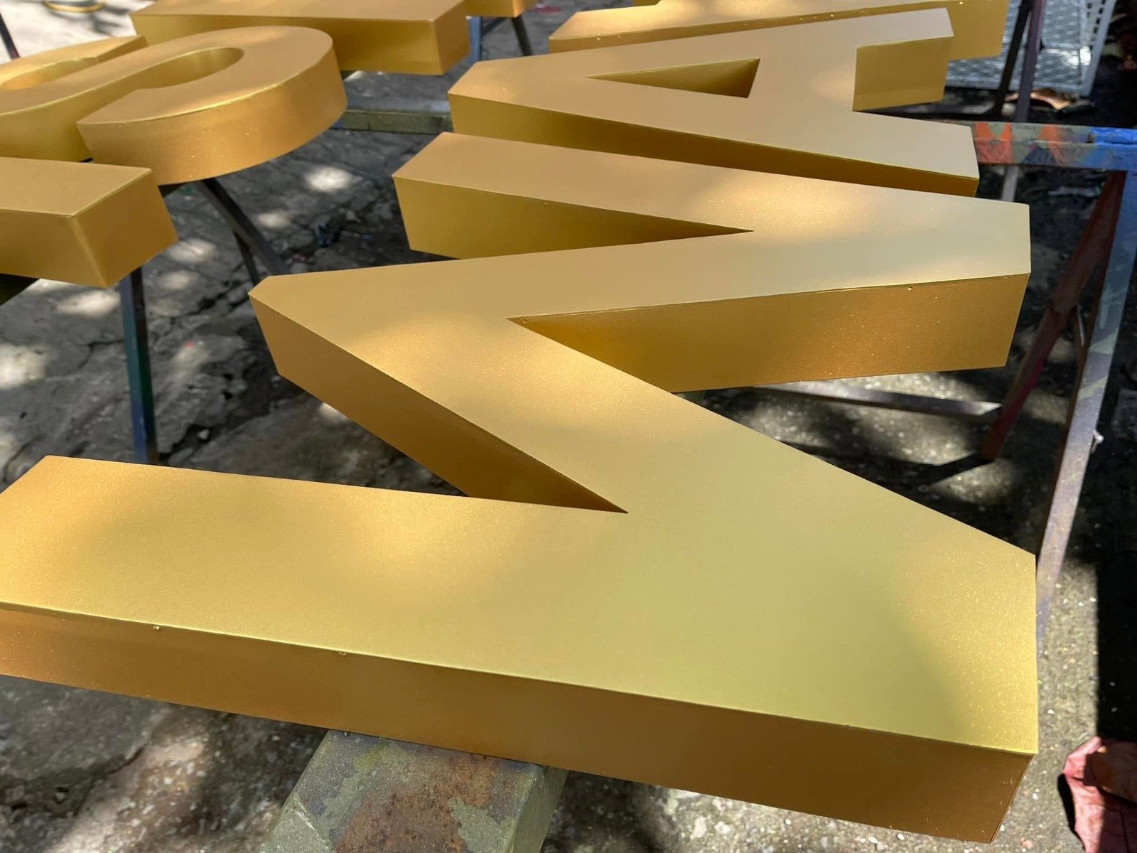 Custom gold 3D channel letters signage