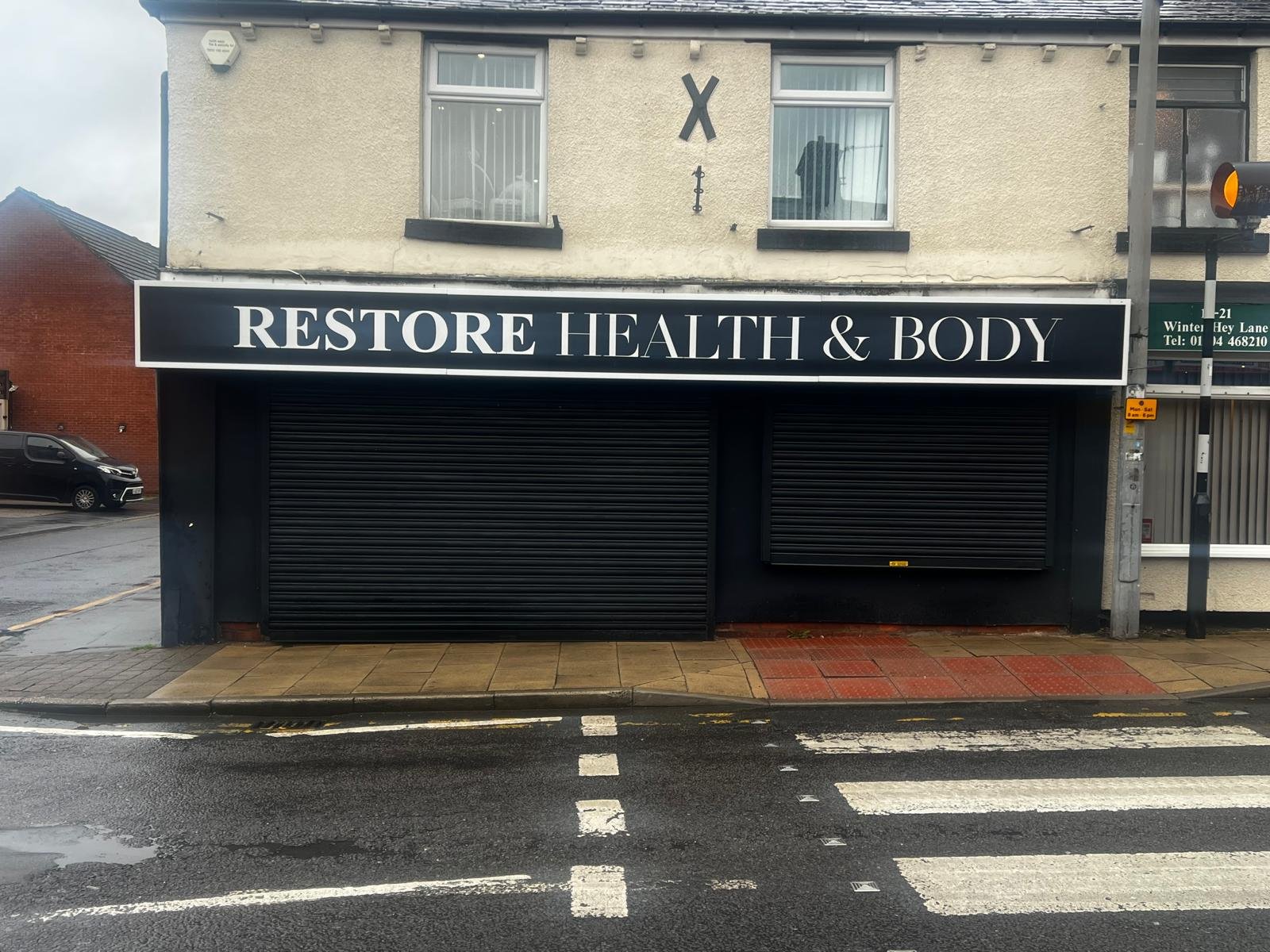 Restore Health and Body shop fascia signboard